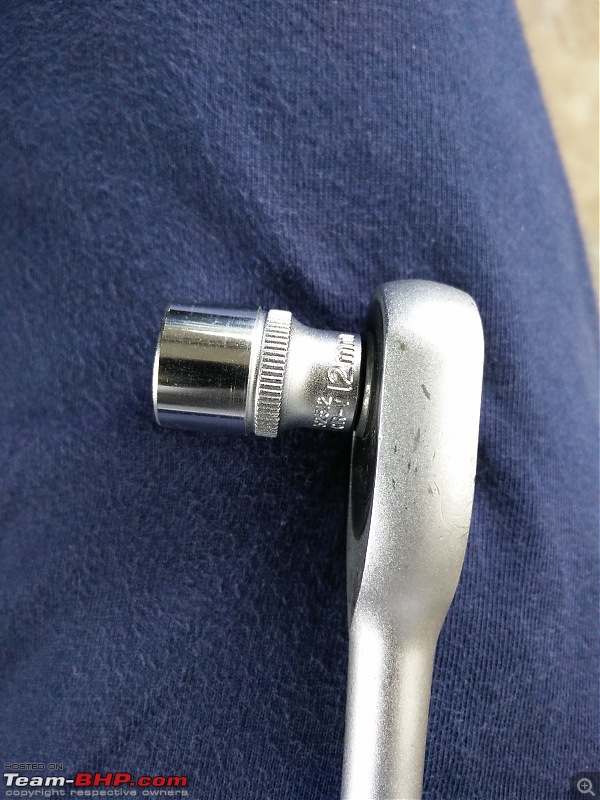 DIY: Brake Disc Caliper Pin Replacement-4.-12mm-socket-remove-caliper-holding-bolt.jpg