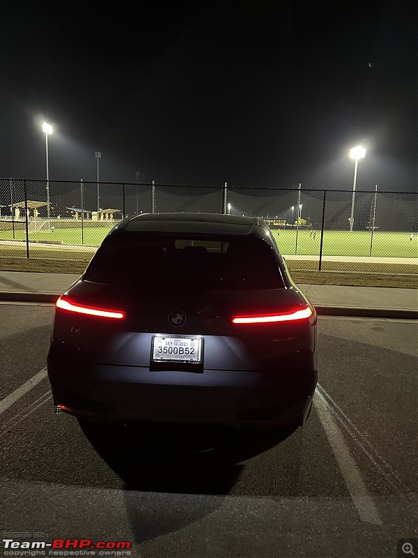 BMW IX xDrive50 AWD SUV | Initial Ownership Report-back-night.jpeg