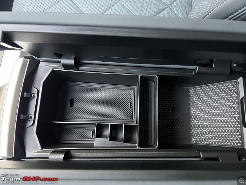 BMW IX xDrive50 AWD SUV | Initial Ownership Report-center-consolde-storage-accessory.jpeg