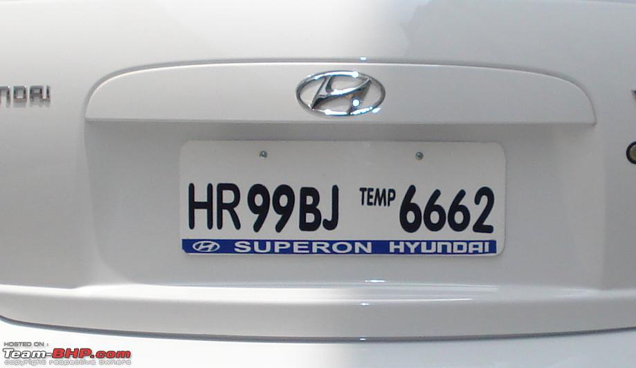 Is it ok to have dealer's name on the number plate? - Team-BHP