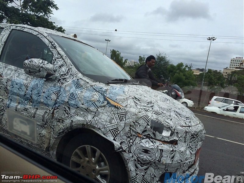 Tata Tiago-based compact sedan. EDIT: Tigor launched at Rs 4.7 lakhs-tatakitespiedheadlamps.jpg