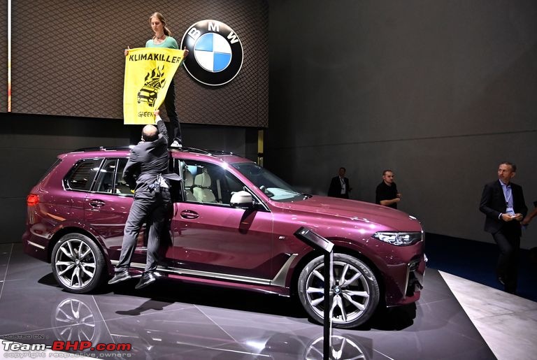 Future of Frankfurt Motor Show uncertain-greenpeaceactiviststandingonabmwcarholdsaposternewsphoto1568472291.jpg