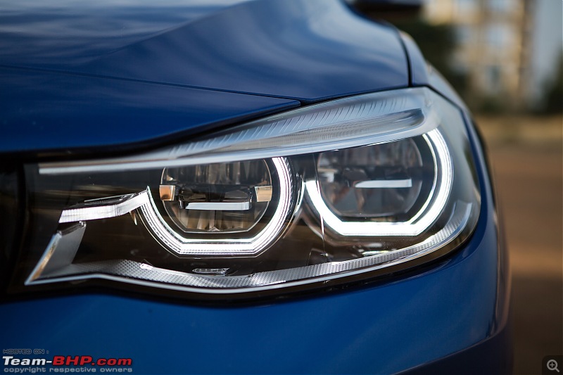 A GT joins a GT - Estoril Blue BMW 330i GT M-Sport comes home - EDIT: 100,000 kilometers up-headlight.jpg