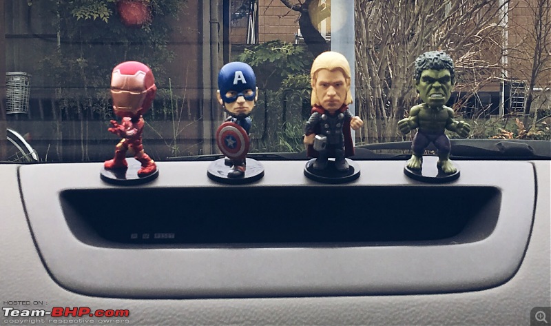 funko pop on car dashboard