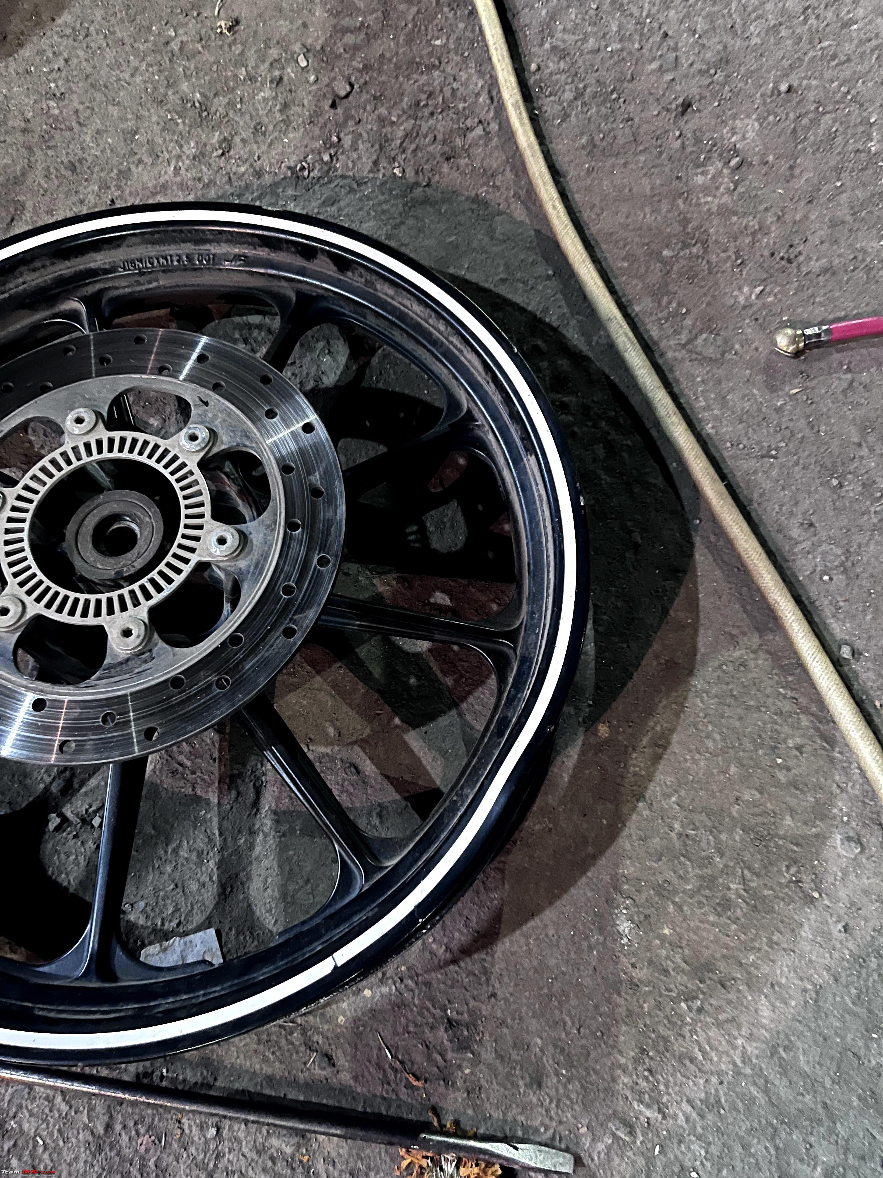 Motorcycle wheel bent after hitting pothole | Now what? - Team-BHP