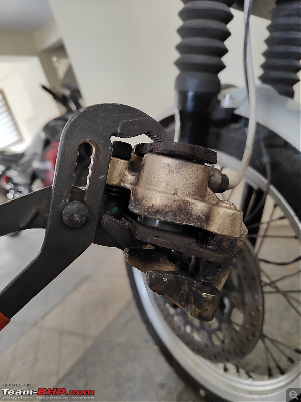 My pre-owned Royal Enfield Interceptor 650 Ownership Review | Meet my "Summer Orange"-brake-pad-change.jpg