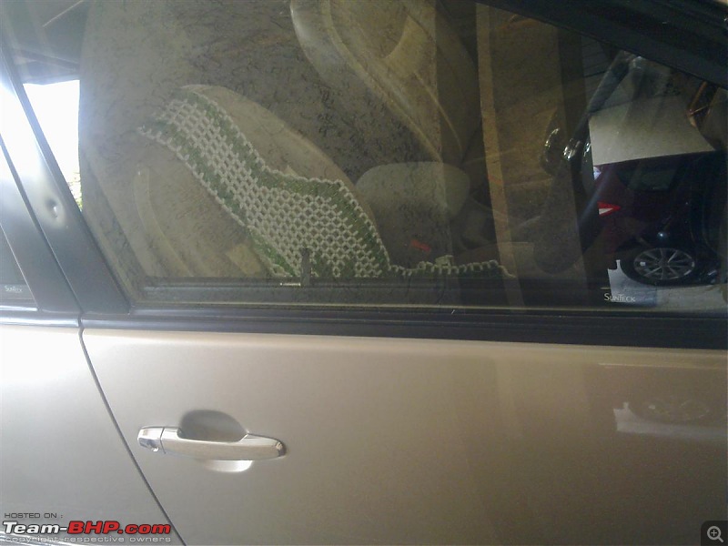 Mahindra XUV500 : Test Drive & Review-sunteck-retractable-door-sunshade-1.jpg