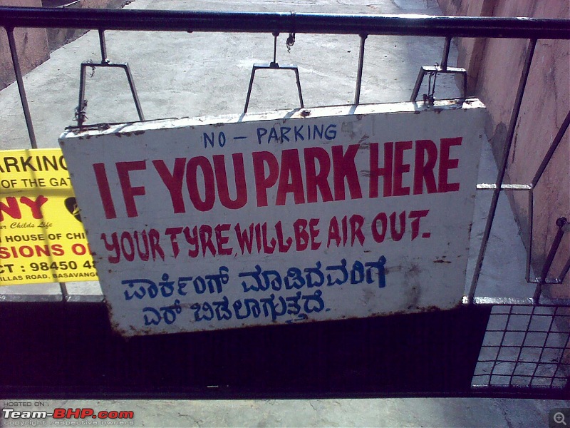 How do you stick a bell on a wall? Pics of Quirky signs, captions & boards-airoutparking.jpg