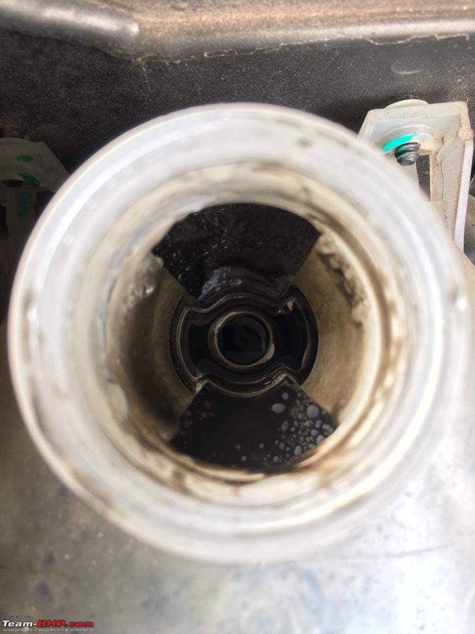 Black soot in coolent fill tank. Need advice!