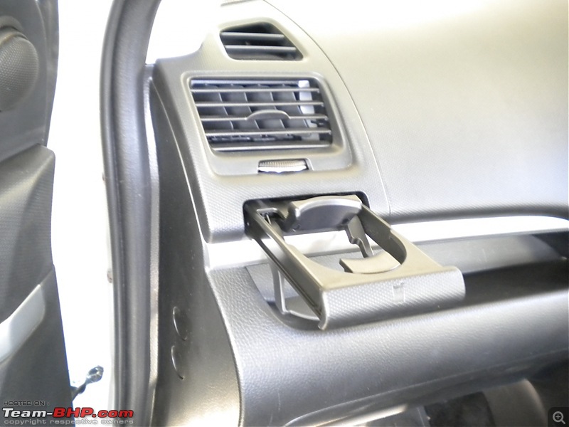 White Pearl - My 2011 Maruti Swift-cup-holder.jpg