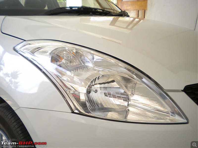 White Pearl - My 2011 Maruti Swift-headlight.jpg