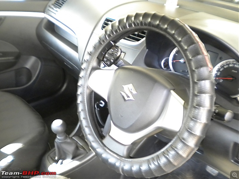 White Pearl - My 2011 Maruti Swift-steering.jpg