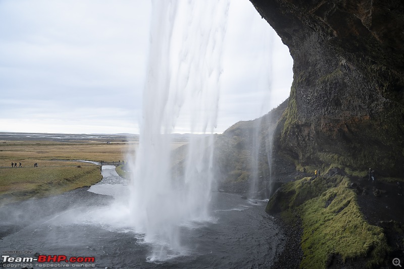 An October odyssey in Iceland with a Toyota Landcruiser-22.18-walking-behind-curtain-water-seljalandsfoss.jpg