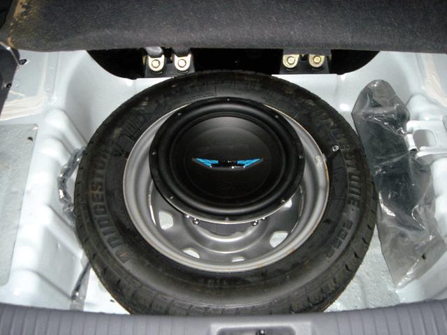 Sub woofers in the spare wheel well. - Team-BHP