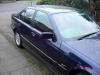 1997 BMW 328i Manual in front of house 2