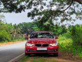 Sunday drive in a Red BMW 320d