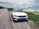 Rainy drive in a BMW 330i